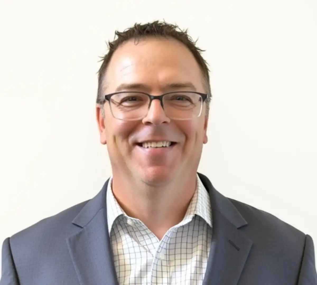 A headshot of Troy Markusson, Head of Global Payroll, CoreWeave