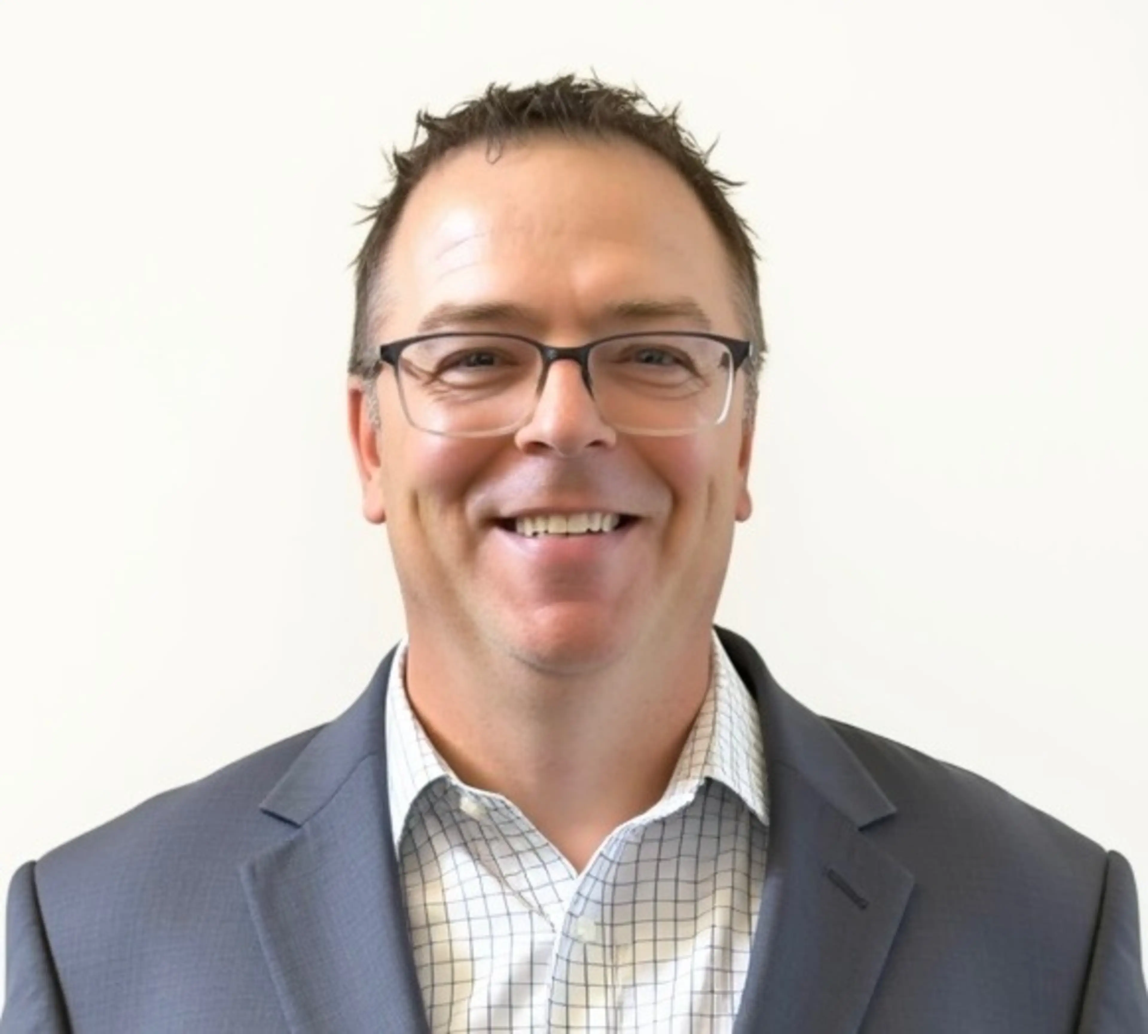 A headshot of Troy Markusson, Head of Global Payroll, CoreWeave