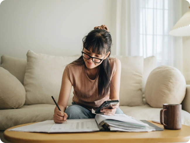 Payroll person crunching numbers.